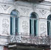 Окна второго этажа и балкон (улица Симановского, 22А)